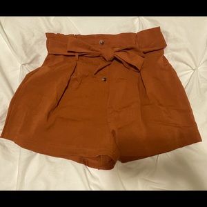Orange high waisted shorts